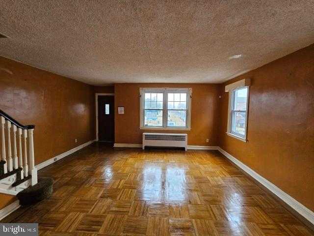 7655 Woolston Ave photo 3