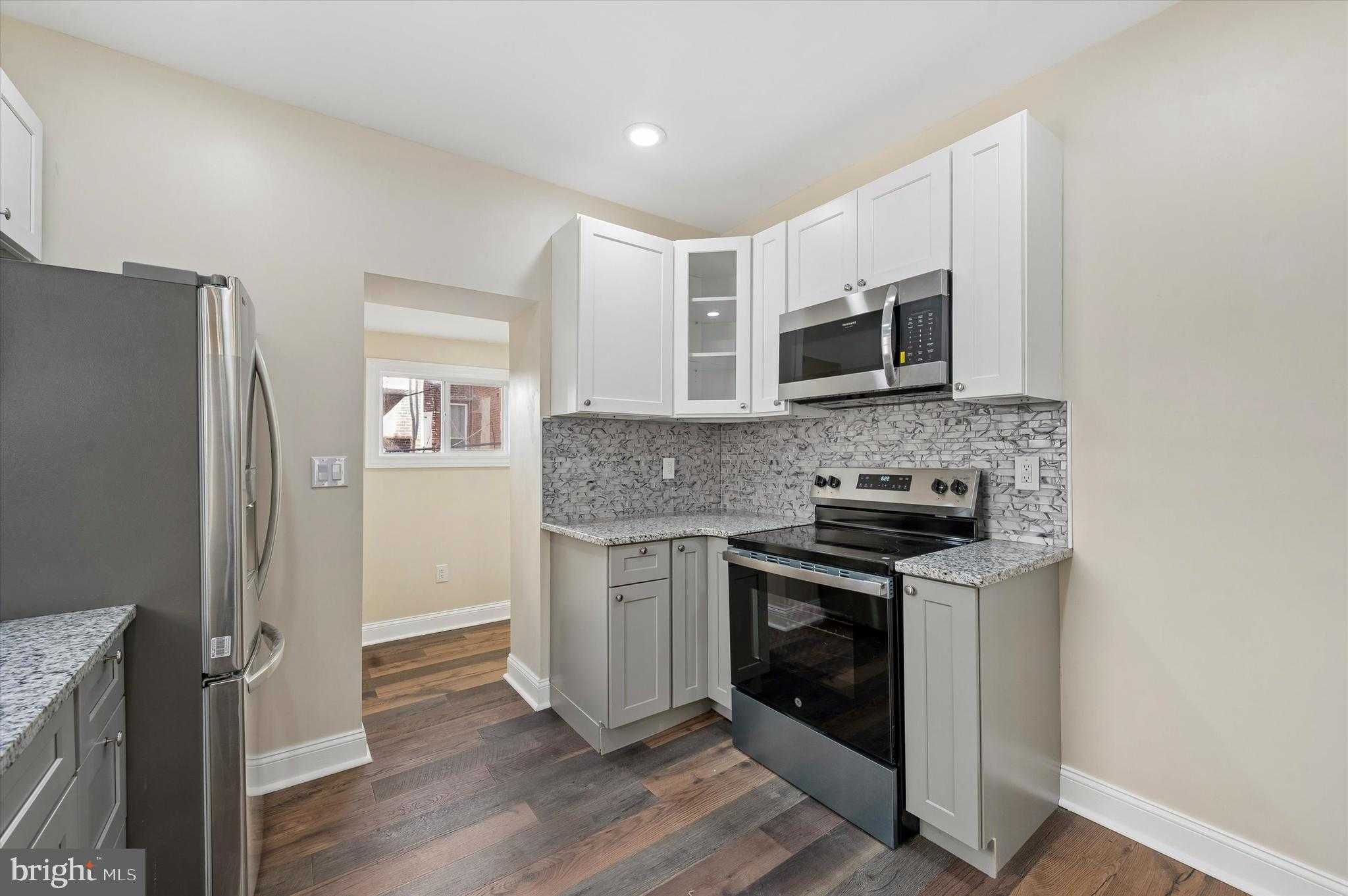 5537 Malcolm St photo 7