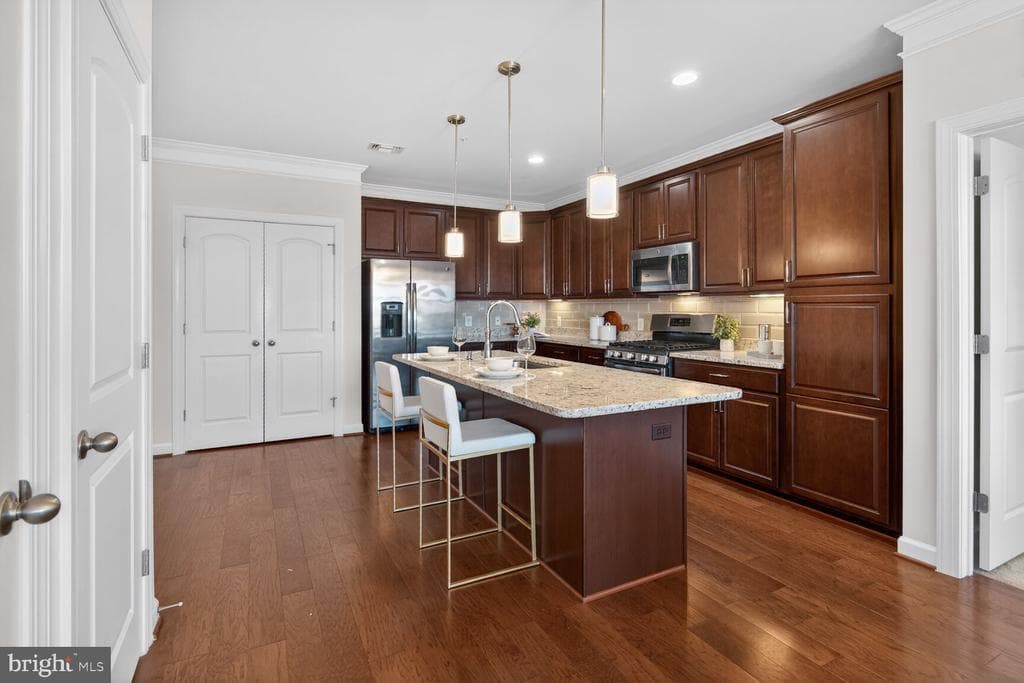 13722 Neil Armstrong Avenue #407 photo 1